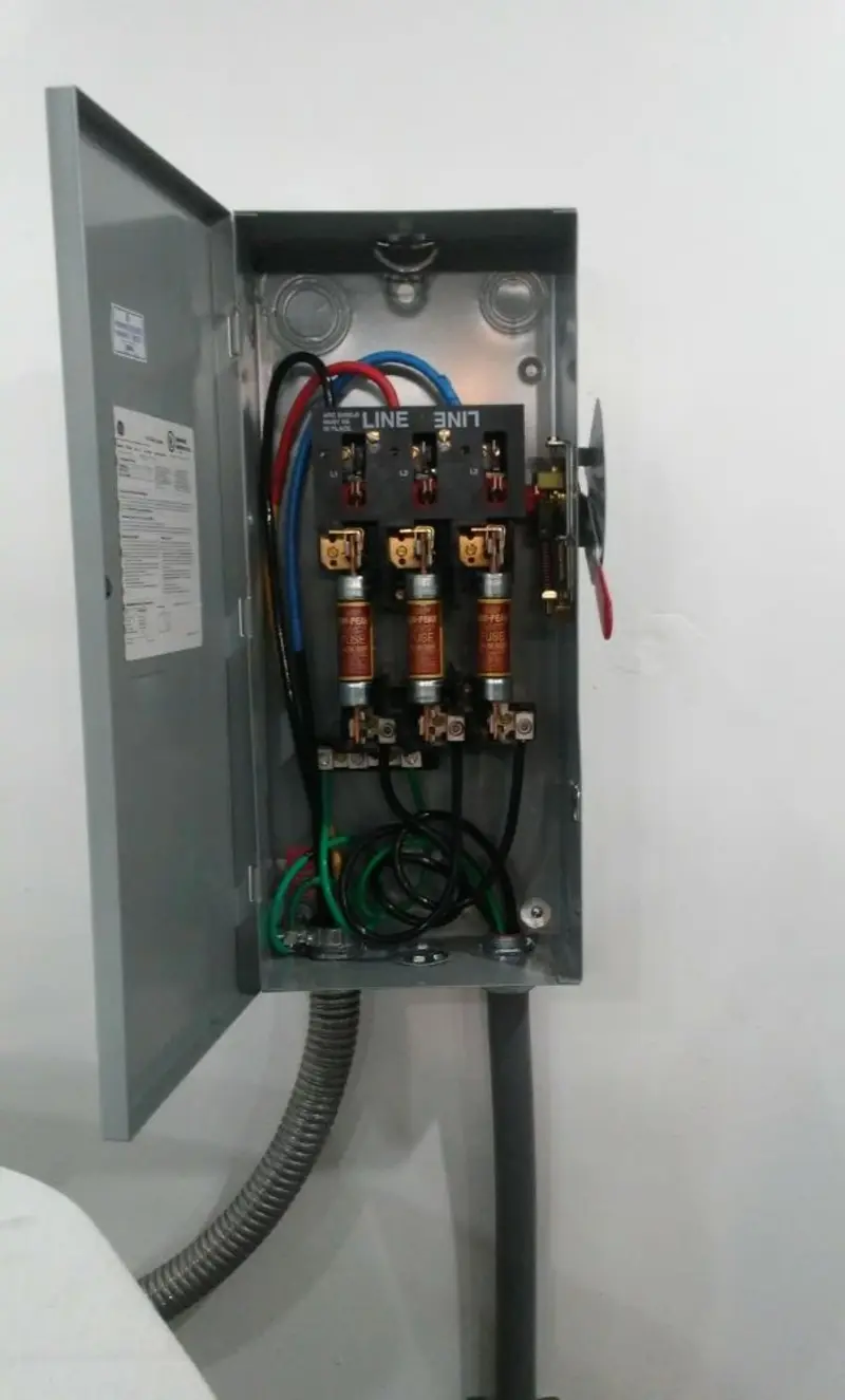 Three-phase disconnect switch installed for Smoke Detector Installation in Modesto